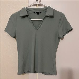 green fitted top